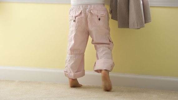 A child toe walking.