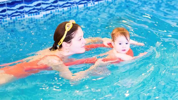 A baby receiving hydrotherapy.