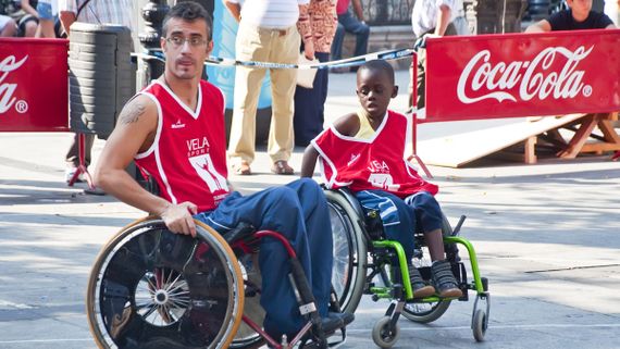 child and adult in wheelchair